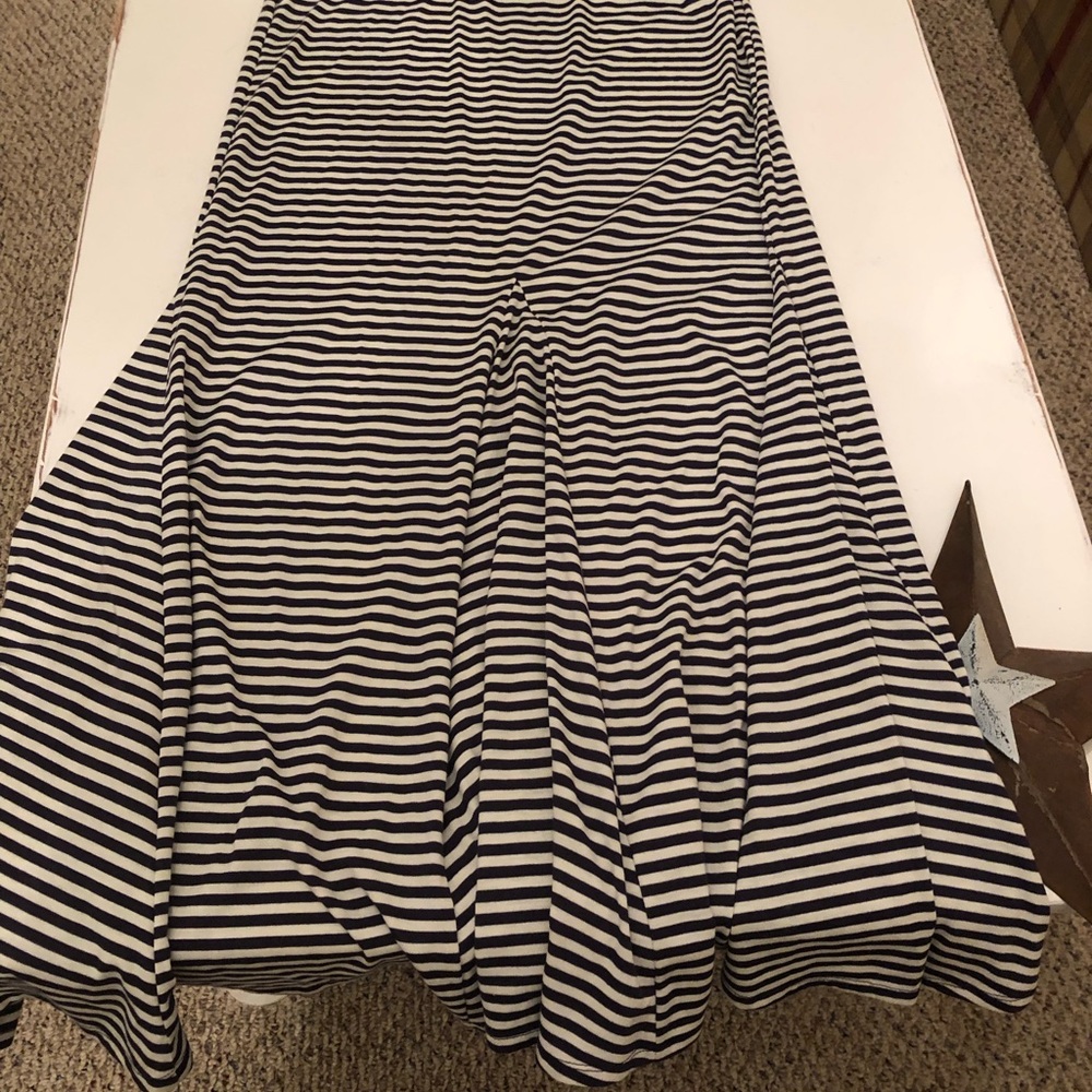 Purchased from Macys , a navy and gray striped maxi skirt with sewn out pleats.